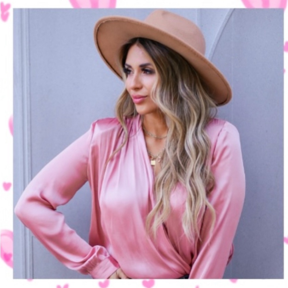 CBRAND Long sleeve cross wrap front bodysuit.
